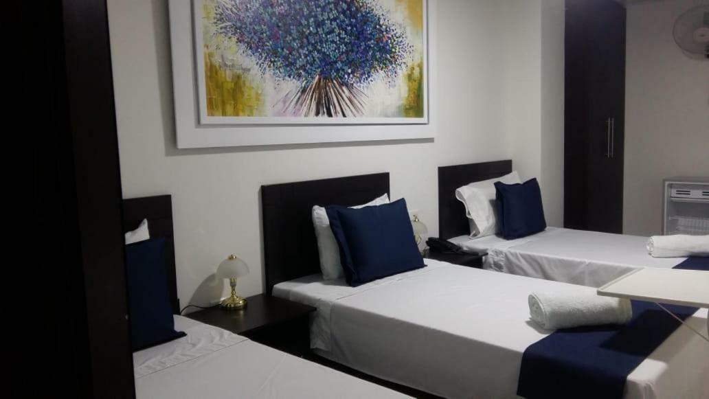 Hotel Giron Plaza Bagian luar foto